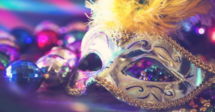 Mardi Gras, Rio carnival mask and colorful decorations.