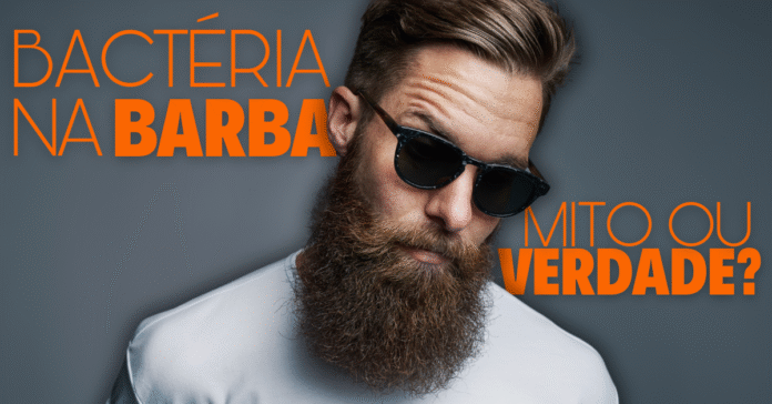 Homem com barba densa ao centro, com os dizeres “Bactéria na barba: mito ou verdade?” ao fundo; imagem conceitual sobre higiene facial