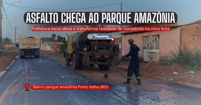 Operário aplica camada de asfalto em rua do bairro Parque Amazônia, zona Leste de Porto Velho, durante obras da prefeitura