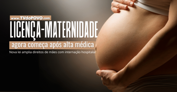 Mulher grávida segurando a barriga em fundo escuro, representando nova regra da licença-maternidade