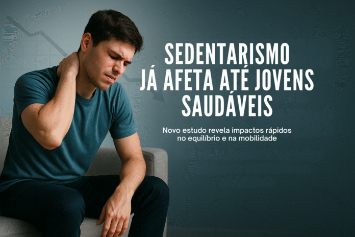 Jovem sentado com dor no pescoço representando os impactos do sedentarismo na saúde de adultos jovens.
