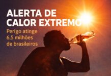 O alerta de calor de grande perigo que pode atingir 6,5 milhões de brasileiros Pessoa se hidrata sob sol forte durante alerta de calor extremo que atinge milhões de brasileiros